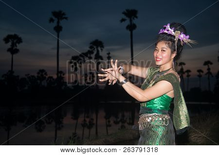 The Lady In Middle Thai Classical Dancing Suit Is Posing Pattern Of Traditional Dancing,and Sugar Pa