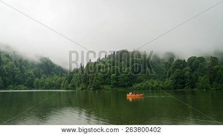 Artvin, Turkey - July 2018: People In A Rowing Boat In Borcka Karagol Nature Park