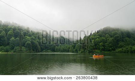 Artvin, Turkey - July 2018: People In A Rowing Boat In Borcka Karagol Nature Park