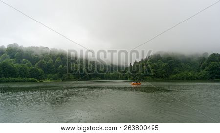 Artvin, Turkey - July 2018: People In A Rowing Boat In Borcka Karagol Nature Park