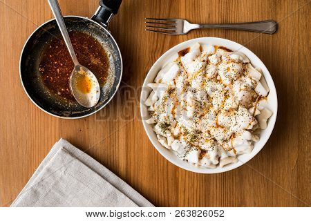 Turkish Manti Manlama / Ravioli With Yogurt And Fried Butter Sauce.