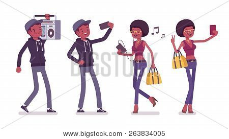 Young Black Man And Woman With Gadgets. Millennial Boy And Girl With Afro Hair Holds Smartphone, Lis