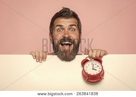 Man With Beard Hold Alarm Clock. Time Management And Business Success. Hipster With Red Clock On Pin