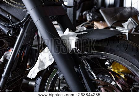 Cropped Close Up Shot Of Beautiful And Custom Made Motorcycle In The Workshop