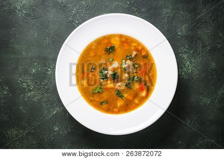 Traditional Hungarian Goulash Soup On The Table. European Cuisine. Top View,