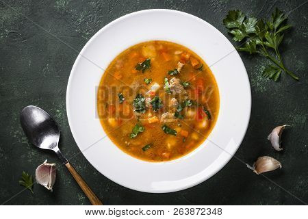 Traditional Hungarian Goulash Soup On The Table. European Cuisine. Top View.
