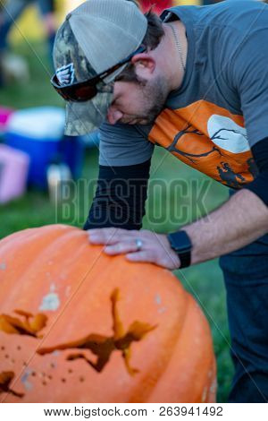Chadds Ford, Pa - October 18: Person Carving Pumpkin At The Great Pumpkin Carve Carving Contest On O