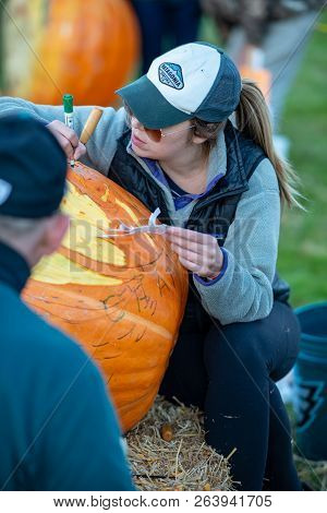 Chadds Ford, Pa - October 18: Person Carving Pumpkin At The Great Pumpkin Carve Carving Contest On O