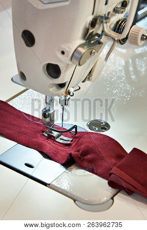 Needle And Foot Of Sewing Machine