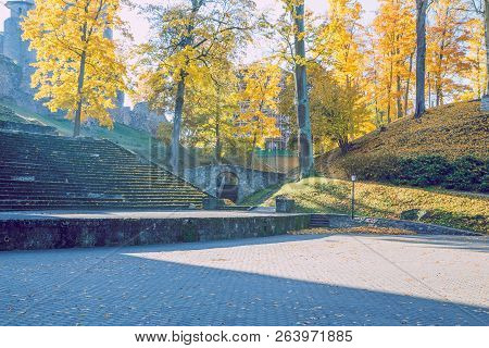 Old Casttle Park At Autumn. Yellow Leafs, Ruins And Architecture. Historic Buildings. Travel Photo 2