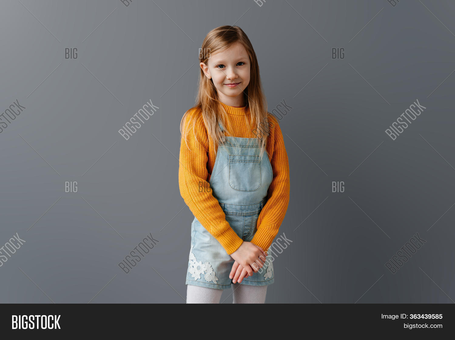 Young Tween Girl Poses For Photo In Fancy Dress