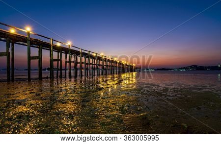 Wooden Bridge Of Chan Damri Beach At Sunset ,ranong ,thailand