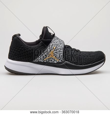 Vienna, Austria - February 14, 2018: Nike Air Jordan Trainer 2 Flyknit Black, Metallic Gold And Whit
