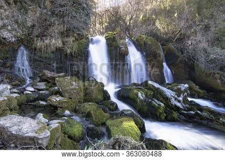 Beautiful Landscape Showing Some Waterfalls And Some Rocks In A Forest. The Place Is Called La Dou D