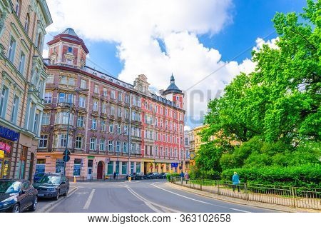 Wroclaw, Poland, May 7, 2019: Street Of City With Multistory Buildings Near Plac Square St. Matthias