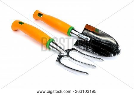Garden Tools . Garden Shovel And Fork Isolated On A White Background. Trowel And Fork For Gardening.