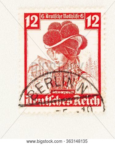 Seattle Washington - April 25, 2020: German Reich Stamp  Featuring  Gutachtal Woman With Bollen Hat,