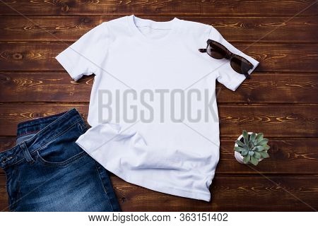 White Unisex Cotton T-shirt Rustic Mockup With Sunglasses, Jeans And Succulent Plant. Design T Shirt