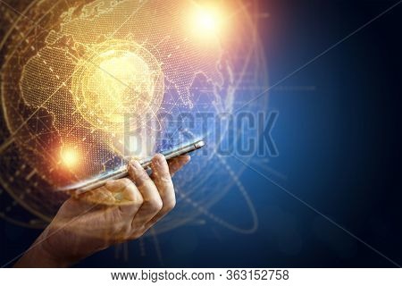 Smartphone And Hologram Planet Earth New Technology. Globalization, Network, Fast Internet, New Tech