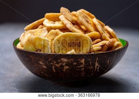 Healthy Sweet Snack, Crispy Dehydrated Unsugared Banana Chips In Bowl