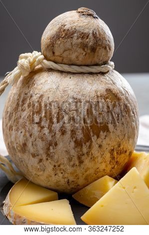 Italian Semi Hard Matured Caciocavallo Cheese, Handmade And Aged In Natural Underground Caves In Apu