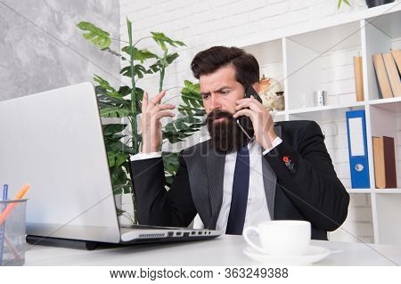 Managing Everything. Manager Talk On Phone In Office. Office Manager Work At Desk. Project Manager U