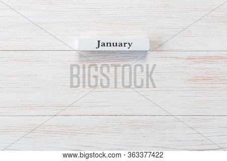 Whine Wooden Block Of Calendar With Month January On Vintage Background. Inscription January On Wood