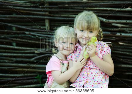 Girls Play With Duck