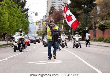 Downtown Vancouver, Bc, Canada - Apr 26, 2020: Anti Lockdown Protesters March In Defiance Of The Gov