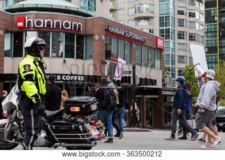 Downtown Vancouver, Bc, Canada - Apr 26, 2020: Anti Lockdown Protesters March In Defiance Of The Gov