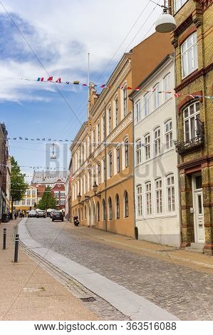 Haderslev, Denmark - June 26, 2019: Historic Houses And Little Flags In The Center Of Haderslev, Den