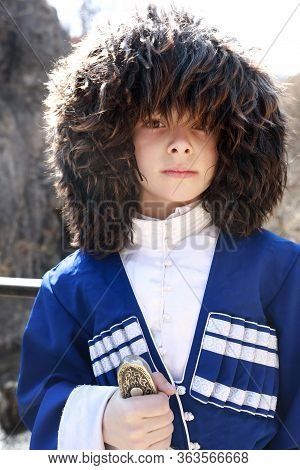 Kid In Traditional Karachai Clothes