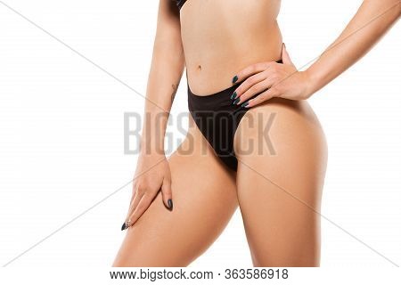 Beautiful Female Legs, Buttlocks And Belly Isolated On White Background. Beauty, Cosmetics, Spa, Dep