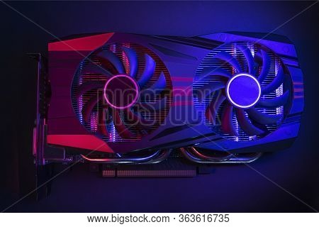 Photo Of The Graphic Card Is Made In The Style Of Cyberpunk. Red-blue Background