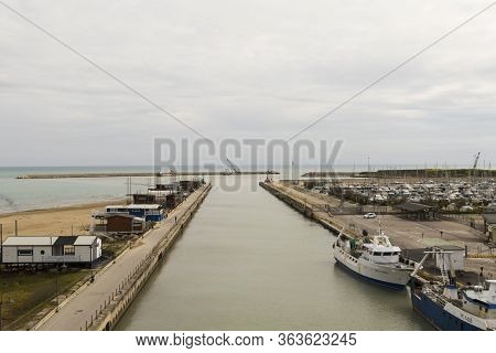 Pescara, Italy - 13 April 2019: View Of Pescara River In A Cloudy Day From The Pedestrian Bridge