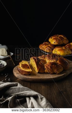 Fresh Baked Brioche With Chocolate Chips On Dark Wooden Background