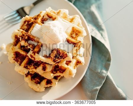 Ricotta Cheese Chaffles For Keto Diet. Stack Of Ricotta And Lemon Belgian Waffles Decorated With Ice