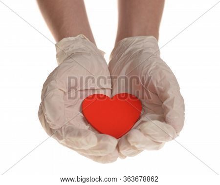 Hearts In Hand With Rubber Gloves Isolated On White