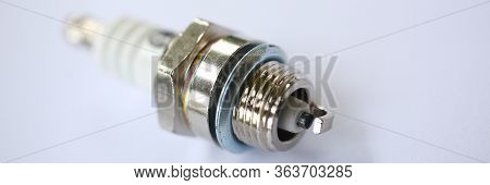 Close-up Of Metal Car Spark Plug Using For Ignition. Device Made From Steel Ceramic And Aluminum. Se