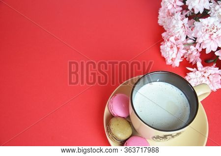 Beige Cup Cappuccino Beautiful White-pink Aster Flowers On A Red Background. Good Morning. Greeting 