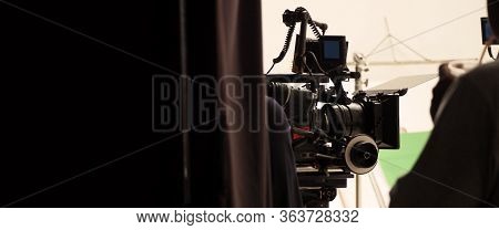 Behind The Shooting Production Crew Team And Hd Video Camera.