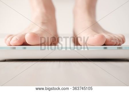 Bare Feet Stand On Smart Scales That Makes Bioelectric Impedance Analysis, Bia, Body Fat Measurement