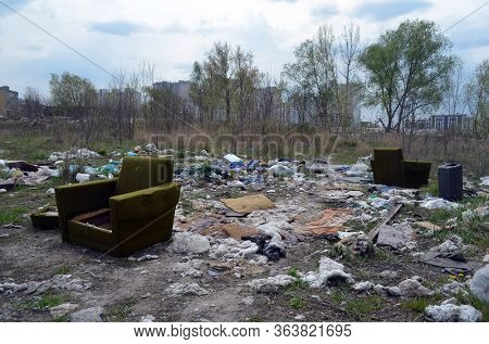 Spring landscape.Ecology of Ukraine. Nature near Ukrainian capital. Environmental contamination. Illegal junk dump. April 25, 2020 Kiev,Ukraine