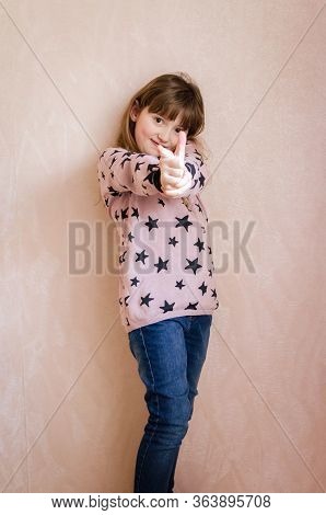 Little Girl With Long Dark Blonde Hair And With A Cute Smile On Face Loves Life And Dreams To Be A M