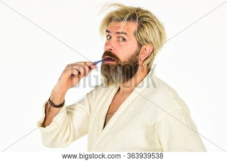 Stay Healthy. Keep Teeth Healthy. Brush Teeth. Morning Routine. Oral Hygiene. Mature Man In Bathrobe