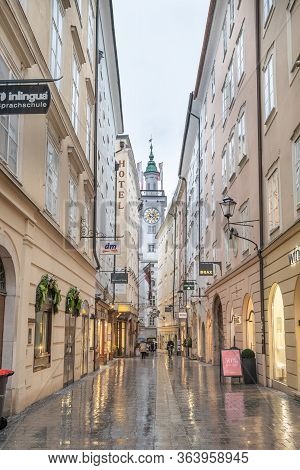 Feb 3, 2020 - Salzburg, Austria: Sigmund Haffner Boutique Street View In Rainy Days With City Hall C