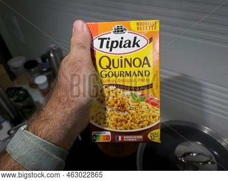 Paris, France - Sep 1, 2022: Pov Male Hand Holding Package With Bio Organic French Tipiak Quinoa Gou