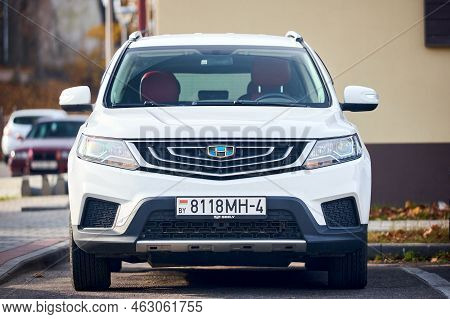 Hrodna - October 2021: White Geely Boyue Geely Atlas Proton X70 Car Parked In Street. Geely Atlas Co