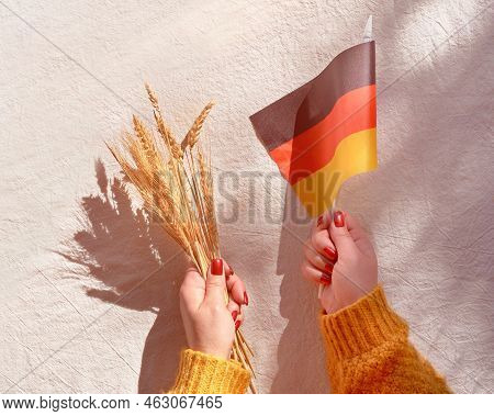 Happy Erntedankfest, Harvest Thanksgiving Day In German Language. German Flag And Bunch Of Wheat Ear
