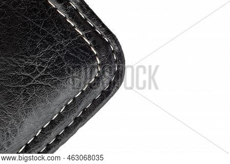 A Piece Of Leather Stitched With Threads On A White Background With Free Space For An Inscription. L